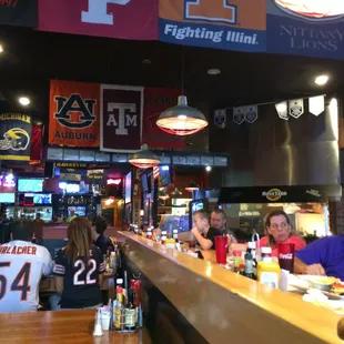 people sitting at the bar