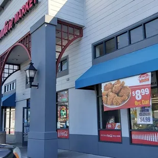 a car parked in front of the store