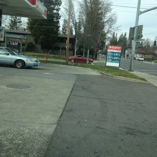 a gas station and a car