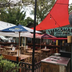 Wagshal's patio area is most excellent place to eat, hang, and watch folks driving and cycling by