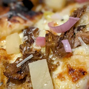 Luau pizza, with red onion, pulled pork and pineapple