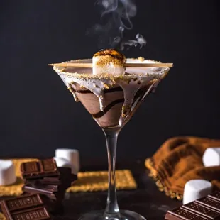 a chocolate martini garnished with marshmallows