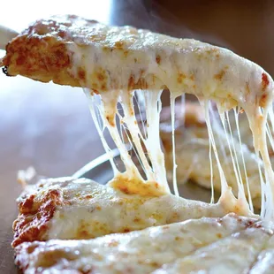 a slice being lifted by a fork