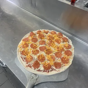 Raw pizza pepperoni