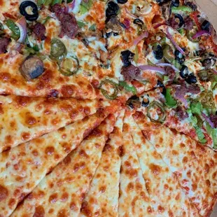 Half veggie and half cheese on thin crust.... Mouth watering