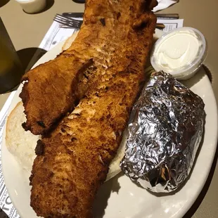 two fish sticks on a plate