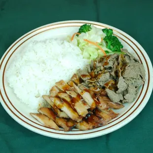 a plate of rice, meat, and broccoli