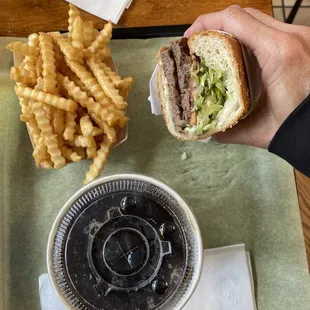 Trio of fries, drink and lamb burger. I ordered this with all the fillings on half the bread (carb counting)