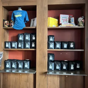 a display of coffee bags and other items