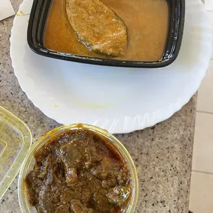 Shorshe Ilish Goat Rezala