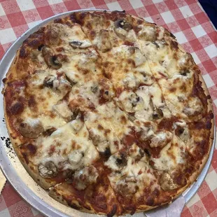 Thin crust sausage mushroom