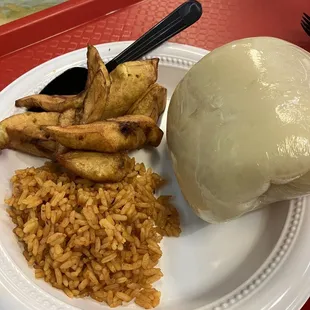 Jollof Rice, fried plantain, and foo foo