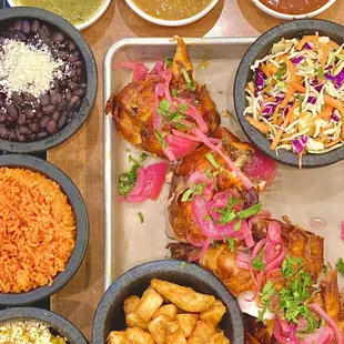 Rotisserie Chicken, crispy bonita potatoes, Mexican Coleslaw, Black Beans, Mexican Style Rice, esquites (03/2023)