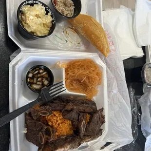 Red Rice, BBQ, Potato Salad, Chicken Kelaguen, Empanada, Finadene, kimchi noodles.