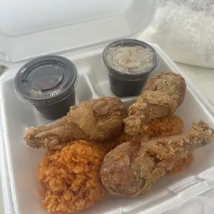 Fried chicken plate w/red rice and one extra chicken!