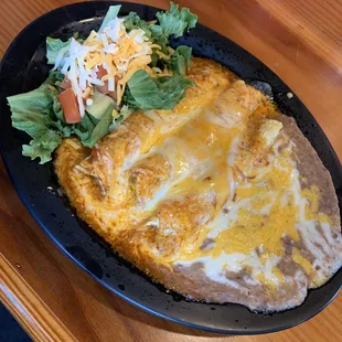 Enchiladas were good.  Garrys green chili burger was good.  The service was great.  Love the atmosphere