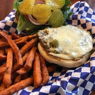 Green chili Swiss burger with sweet potato fries. Make my day!