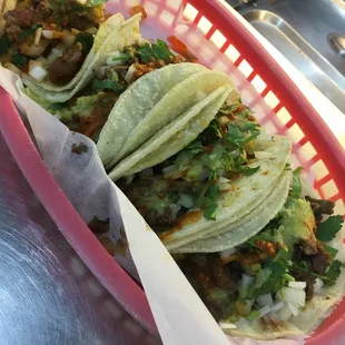 three tacos in a basket