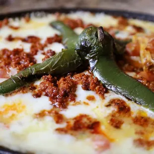 queso fundido, eat it with flour or corn tortillas.