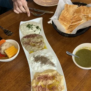Mix Mezze served with naan, sides of chutney sabz and torshi (pickled veg)