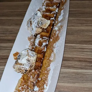 Waffle Stick with honey, toasted marshmallows and biscoff crumbs