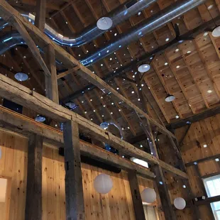 The loft where the DJ is at and the desco ball lights on the ceiling