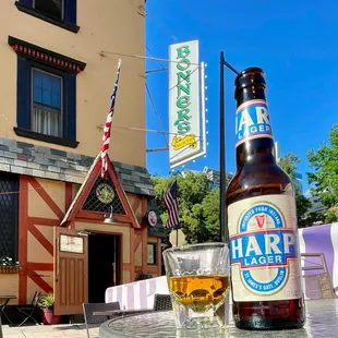 a glass of beer on a table