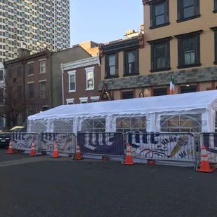 a tent with graffiti on it