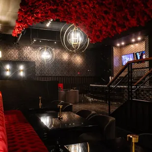 a red couch and a black table