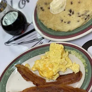 Bacon scrambled eggs American cheese and chocolate chip pancake