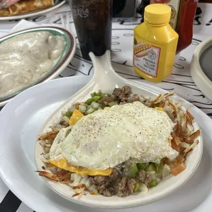 Ozark Special with a side of biscuits and gravy. Eggs over easy.