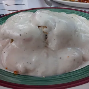 ONE biscuit and gravy. Decent but bland.