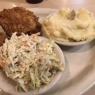 Fried chicken with 2 sides.. Mash potatoes/ slaw