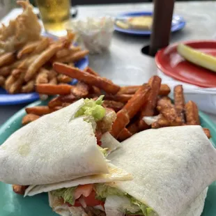 Bourbon Chicken wrap with sweet potato fries