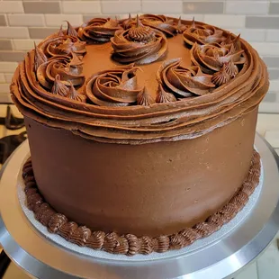 This beautiful yellow is frosted with a chocolate buttercream that was infused with a semi-sweet chocolate ganache!!