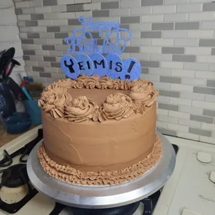 Birthday yellow cake with chocolate buttercream frosting!
