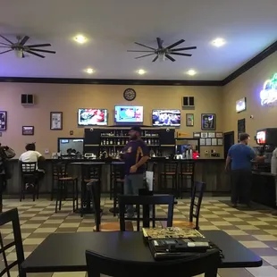 a restaurant with a checkered floor