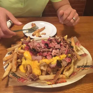 Good start. Cheese fries with pork.