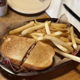 Turkey Sandwich with fries.