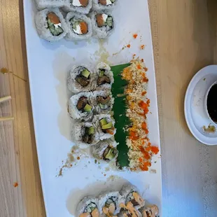 8 Piece Philly Roll, 8 Piece Spicy Salmon Roll, 8 Piece Una-Avo Roll, Smokehouse Roll