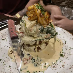 Red fish &quot;crab cake&quot; special over fried egg plant medallions with grilled shrimp