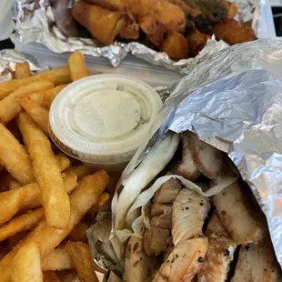 Chicken Gyro with fries and zucchini fries in the back!