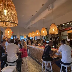  people sitting at the bar