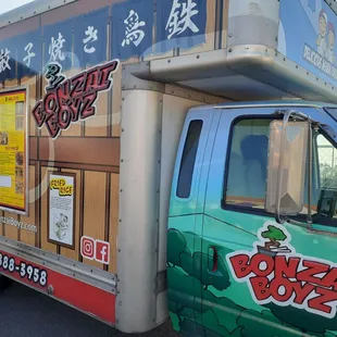 a food truck parked in a parking lot