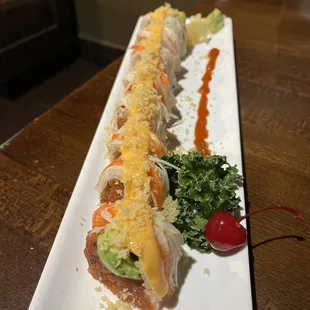 a long plate of sushi