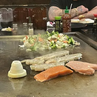 Salmon, shrimp, chicken and vegetables