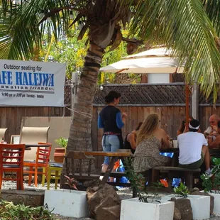 a group of people sitting at a table