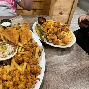 two plates of fried food
