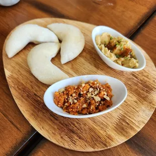 Sampler of fermented hummus and pita