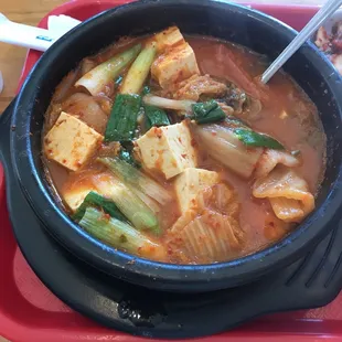 Boodae/Budae Jjigae, beautifully hot &amp; flavorful and made with ripe kimchi, tender tofu &amp; pork.